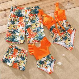 PatPat Family Matching Swimsuit Orange All Over Tropical Plant Print Splicing Ruffle One-Piece Swimsuit And Swim Trunks Shorts