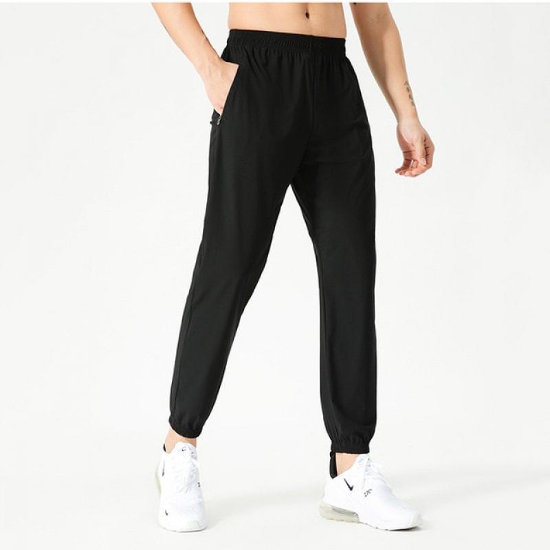 With Logo Men's Quick Drying Elastic Loose Fitting Sports Pants Breathable Fashion Polyester Fitness Pants Casual Daily Training