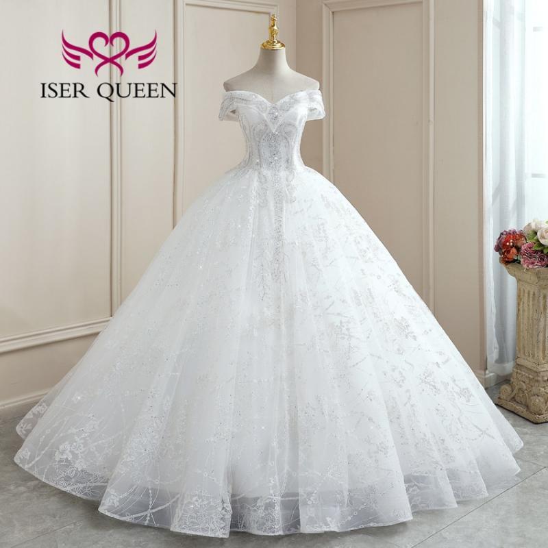 Off Shoulder Short Sleeves Europe Wedding Dress 2023 New Heavy Pearls beads Bright Lace Appliques Ball Gown Bride Dresses WX0256